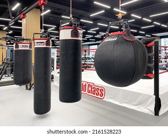 Anapa, Russia May 19, 2022:World Class Gym , Red And Black Punching Bag With Gym Background