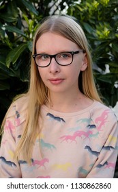 Anapa, Russian Federation - 2 May 2018,  Portrait Of Blond Girl In Park.  Teenager Girl In Eyeglasses Outdoors 