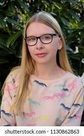 Anapa, Russian Federation - 2 May 2018,  Portrait Of Blond Girl In Park.  Teenager Girl In Eyeglasses Outdoors 