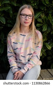 Anapa, Russian Federation - 2 May 2018,  Portrait Of Blond Girl In Park.  Teenager Girl In Eyeglasses Outdoors 