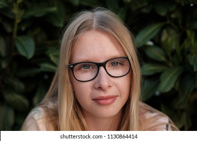 Anapa, Russian Federation - 2 May 2018,  Portrait Of Blond Girl In Park.  Teenager Girl In Eyeglasses Outdoors 