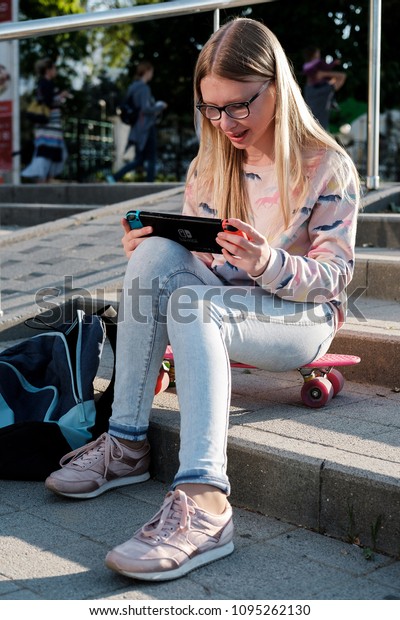 girl playing switch