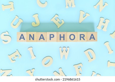 Anaphora Figure Of Speech Concept In English Grammar Class Lesson. Wooden Blocks Typography Flat Lay In Blue Background.