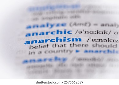 Anarchism word in a dictionary. Selective focus, close up