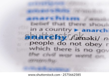 Anarchy word in a dictionary. Selective focus, close up