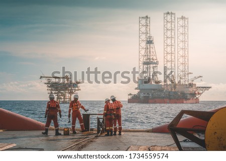 Anchor handling activity during rig move operation at oil field 商業照片 © 