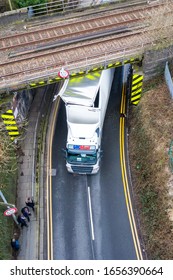 Anchor Road, Stoke On Trent, Staffordshire - 25th February 2020 - A UK Mail Lorry Crashes Into A Railway Bridge On The Busy City Road, HGV Lorry Crash, Large Haulage Vehicle Stuck Under Bridge