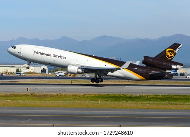 Anchorage, AK / USA - September 12 2018: UPS Cargo McDonnell Douglas MD-11 Departing The Cargo Hub Of Ted Stevens Airport In Alaska. Aircraft MD11 Registered As N294UP Carrying Tons Of Cargo.