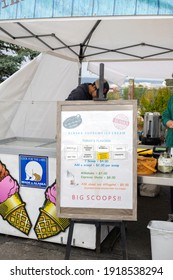 Anchorage, Alaska, United States – August 31, 2019: A View Of The Front And Menu Of Coffee And Ice Cream, A Coffee And Ice Cream Food Booth At The Anchorage Farmer's Market On A Summer Day In 2019.