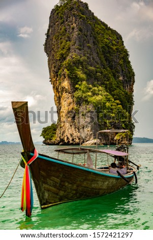 Similar – Foto Bild Longtail am Strand