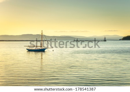 Anchored Sailing Boat at Sunset