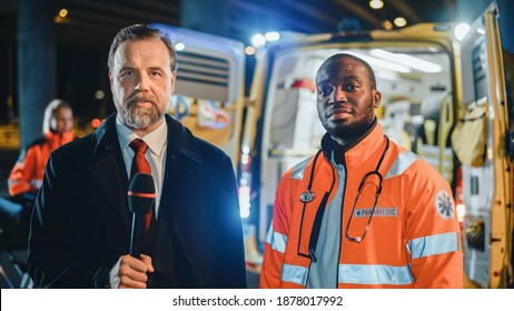 Anchorman Reporting Breaking News Live From a Traffic Accident. Newsreader Takes a TV Interview with Paramedics Doctor. EMS Paramedics Helping Injured Patient to Get into Ambulance on a Stretcher. - Powered by Shutterstock