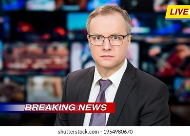 An Anchorman Reporting Live Breaking News Sitting In Tv Studio. Background Of Multiple Screens Of Broadcast Control Room. Journalism Concept