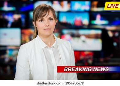 An Anchorwoman Reporting Live Breaking News Sitting In Tv Studio. Background Of Multiple Screens Of Broadcast Control Room. Journalism Concept