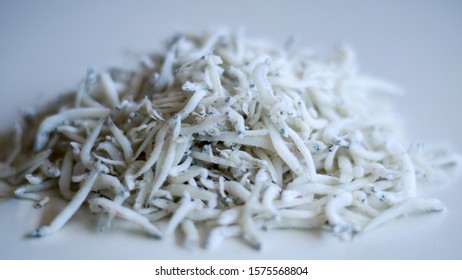 Anchovies Or Engraulidae On White Background. 