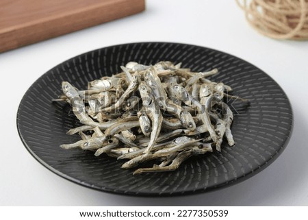 Similar – Image, Stock Photo Dried fish dried fish on bamboo grid