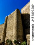 Ancient 7th century Quadrangular tower located in the heart of the Inner city "Icheri Sheher", Walled city, in the capital of Azerbaijan, Baku, as taken in October 2023