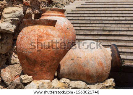 Ancient amphora in old town of Nesebar, Bulgaria. Ancient pottery pots