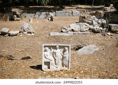 Ancient artistic fresco with three statues from ancient Greece at the excavation site of a Temple of Zeus  - Powered by Shutterstock