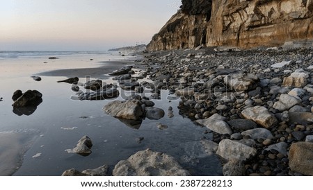 Ancient beach turned to stone revealed at low tide Swamis Beach Encinitas California #3.