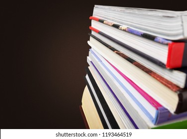 Ancient books in a row on wooden - Shutterstock ID 1193464519
