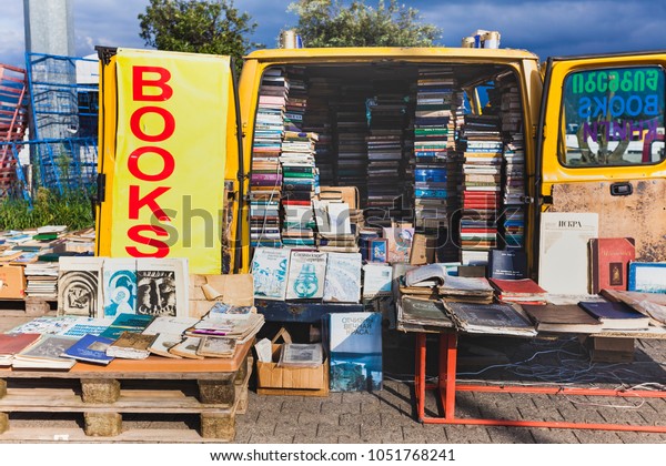 Ancient books are\
sold on the store van counter in the port of Batumi.Georgia,\
Batumi, September 2017