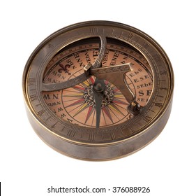 Ancient Brass Compass and Sundial. The image is a cut out, isolated on a white background, with a clipping path. The image is in full focus, front to back.