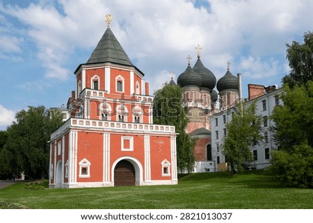 The ancient Bridge Tower and the Cathedral of the Intercession of the Holy Virgin on a July day. Izmailovo, Moscow. Russia
