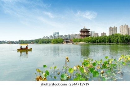 Ancient buildings by the lake: Pagoda, Xi'an, China.