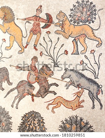 Ancient byzantine natural stone tile mosaics with a image of hunting on wild animals, Mount Nebo, Jordan, Middle East
