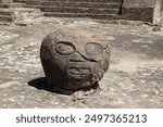 Ancient Carved Stone Head at Great Pyramid of Cholula, Puebla State, Mexico