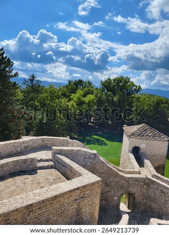 Ancient castle with clouds in the background