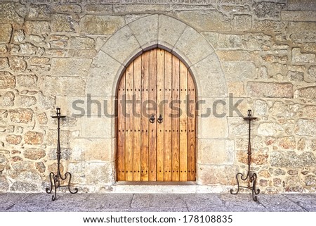 Ancient castle door at the Palace of the Dukes of Braganza, Guimaraes, Portugal
