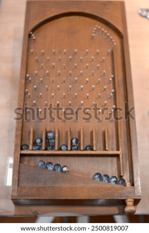 Ancient Chinese children’s toy—pinball machine