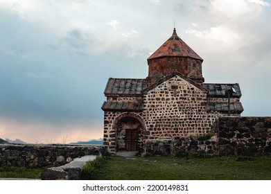 An Ancient Christian Temple Built Of Stone Blocks Located In Armenia On The Shores Of Lake Sevan. Temple Of The Beginning Of The Spread Of Christianity In The World