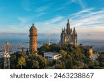 Ancient church on a hill in Barcelona. Bird