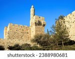 Ancient citadel Tower of David near Jaffa Gate. Jerusalem is the capital of Israel. Protective powerful walls of the Old City of Jerusalem at sunset.