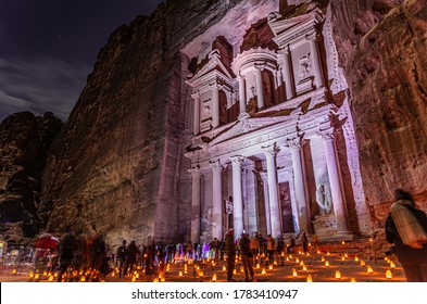 Ancient City Of Petra At Night With Candles. The Treasury