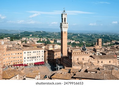 An ancient cityscape with a clock tower surrounded by numerous buildings - Powered by Shutterstock