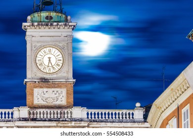 ancient clock tower at night