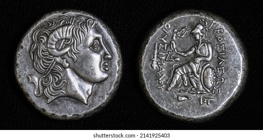 Ancient coin with Alexander the Great portrait and Athena, inscription King Lysimachus on Greek. Silver tetradrachm coin, old rare money, 290 BC. Concept of Hellenistic Greece and valuable coin.