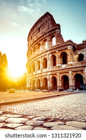 The ancient Colosseum in Rome at sunset - Shutterstock ID 1311321920