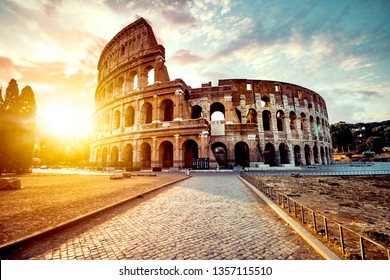 The ancient Colosseum in Rome at sunset