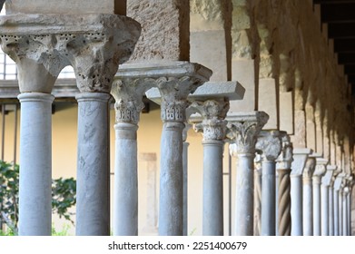 Ancient columns in the cloister of Cefalu Cathedral - Shutterstock ID 2251400679
