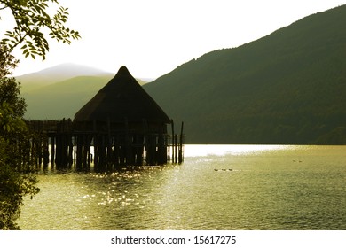 Ancient Crannog House, Loch Tay, Kenmore, Scotland At Sunset