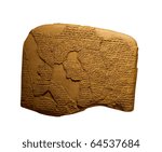 ancient cuneiform writing on clay tablets