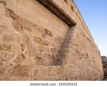 Ancient Defensive Wall Of A Medieval Fortification In A European Castle