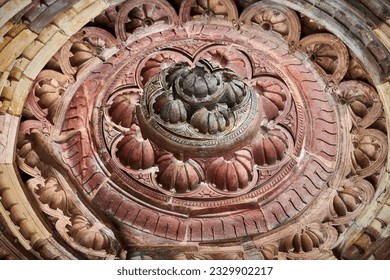 Ancient dome with decorative relief patterns of Qutb complex in South Delhi, India, close up dome in ancient ruins of mosque landmark, popular touristic spot in New Delhi, ancient indian architecture