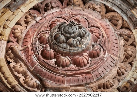 Ancient dome with decorative relief patterns of Qutb complex in South Delhi, India, close up dome in ancient ruins of mosque landmark, popular touristic spot in New Delhi, ancient indian architecture