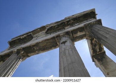 Ancient Doric order columns of the Gate of Athena Archegetis a historic landmark on the grounds of the Hellenistic and Roman Agora of Athens, Greece. 